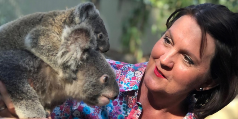 Photo of Jann Stuckey with koala